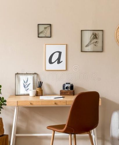 interior-design-scandinavian-open-space-mock-up-photo-frames-wooden-desk-gray-sofa-plant-books-office-personal-180954254